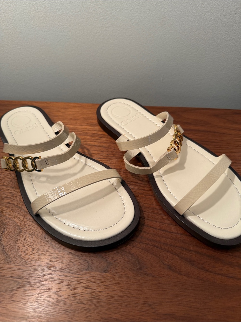 ISSI Cream Strappy Sandals with Gold Chain Accent